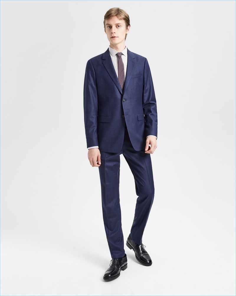 Front and center, Janis Ancens sports Theory's Good Wool suit in admiral blue.