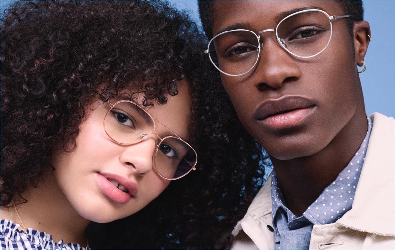 Pictured right, James Kakonge models Warby Parker Hawkins glasses in antique silver.