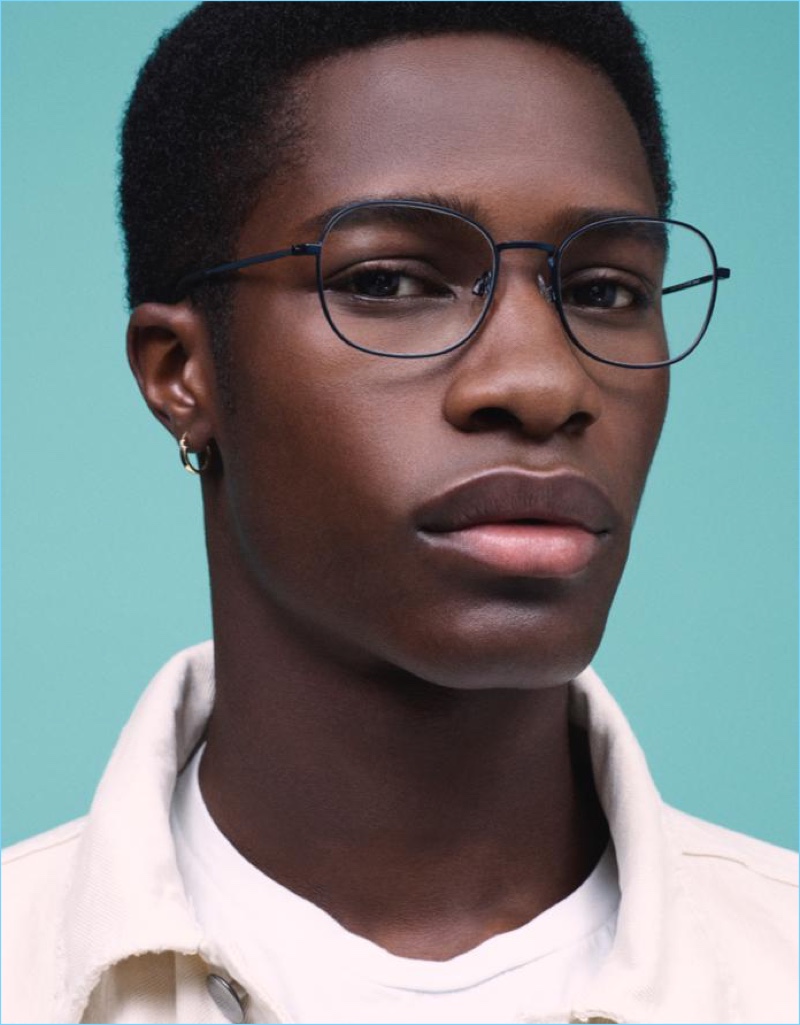 James Kakonge dons Warby Parker Wilcox glasses in brushed navy.