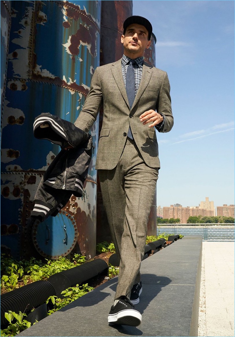 Arthur Kulkov wears a Glen Plaid wool suit from Todd Snyder Black Label.