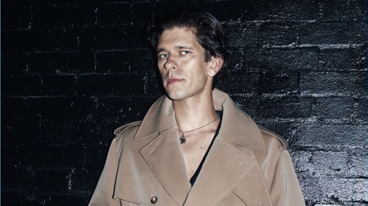 A chic vision, Ben Whishaw wears an Alexander McQueen double-breasted trench coat.