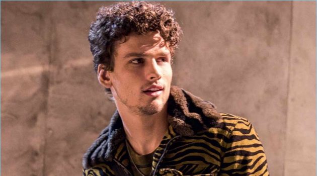 Simon Nessman, Alpha Dia + More Star in Bottega Veneta Fall '18 Catalog Simon Nessman sports a tiger print jacket from Bottega Veneta's fall-winter 2018 collection.