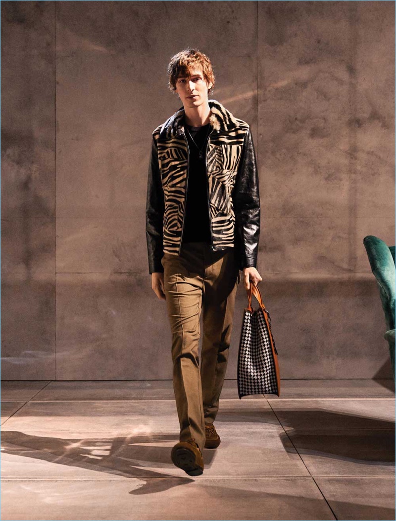 Dylan Fender rocks a look from Bottega Veneta's fall-winter 2018 collection.