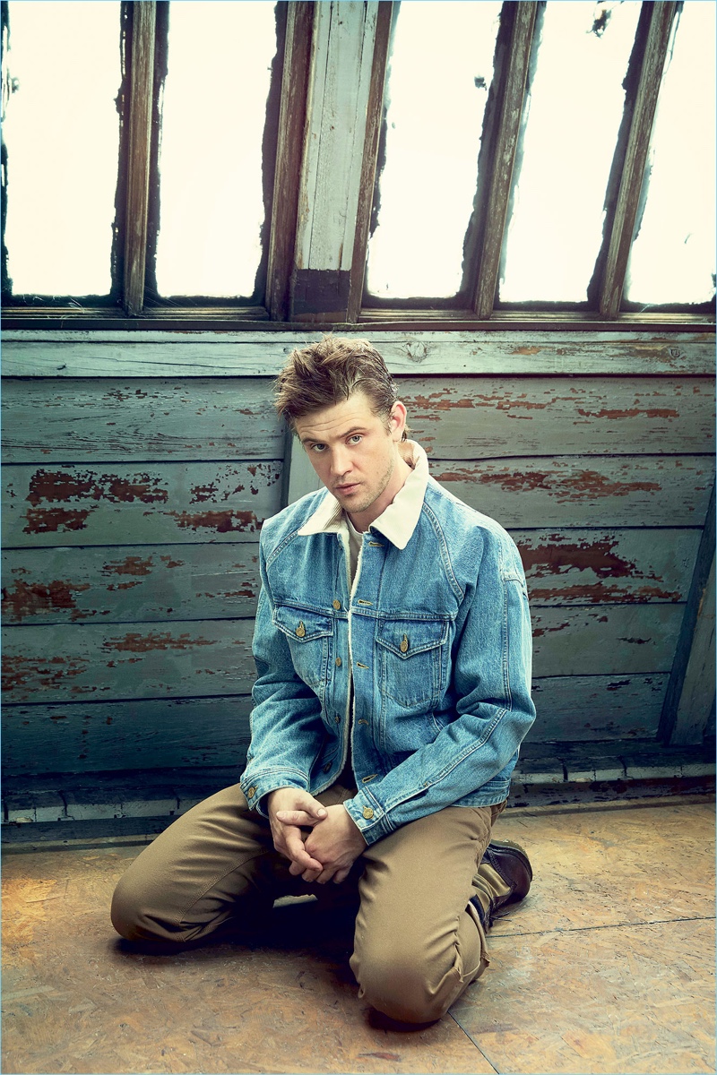 Front and center, Boyd Holbrook wears a Fear of God denim trucker jacket, Cotton Citizen t-shirt, Carhartt WIP pants, and Dr Martens boots.