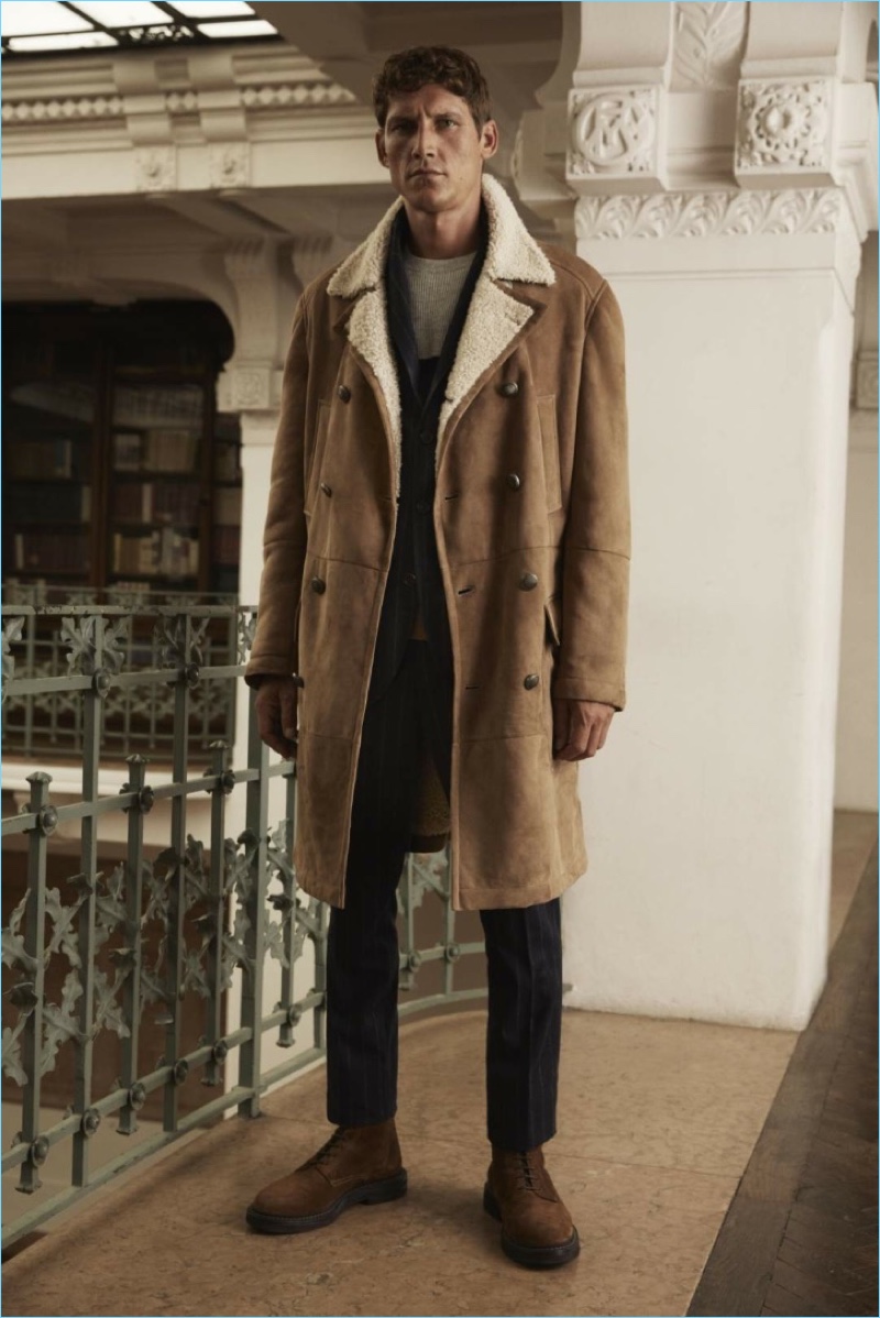 Making a style statement, Roch Barbot dons a shearling coat from Brunello Cucinelli.