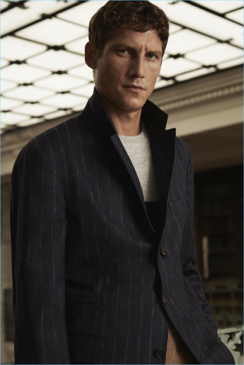 Connecting with Mr Porter, Roch Barbot wears a sleek wool suit jacket from its exclusive Brunello Cucinelli collection.