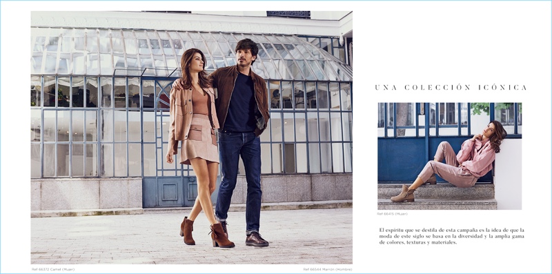 Taking a stroll, Isabeli Fontana and Andres Velencoso don Carmela Shoes' latest styles.