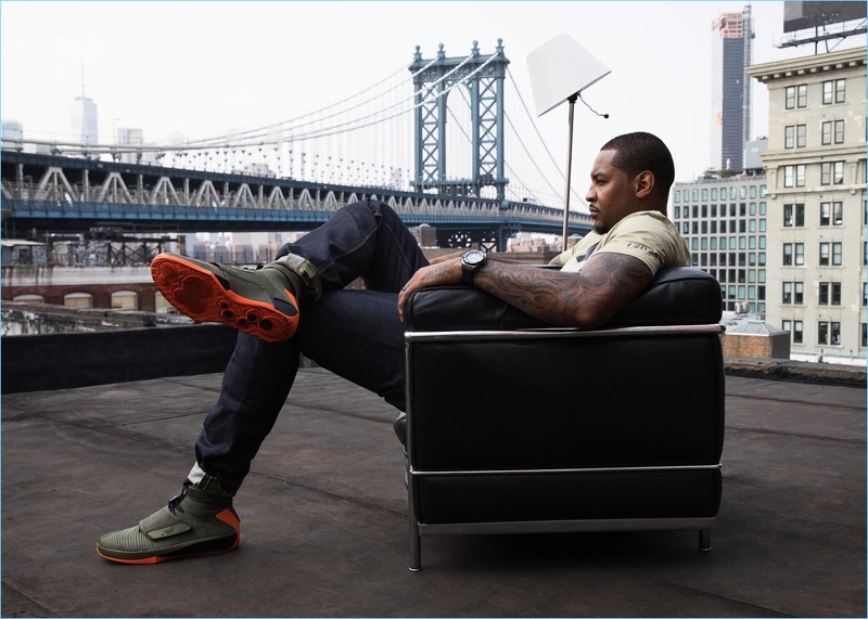 Carmelo Anthony wears the Carmelo Anthony x Rag & Bone AJXX sneaker, which features reflective materials.