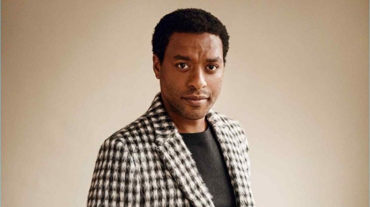 Chiwetel Ejiofor dons an Ermenegildo Zegna Couture sweater and suit.