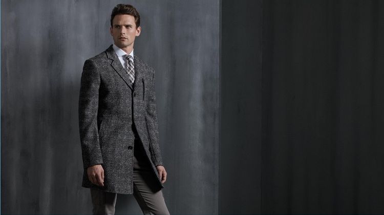 A dapper vision, Guy Robinson wears a sleek coat from Digel.
