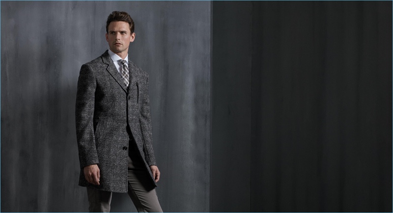 A dapper vision, Guy Robinson wears a sleek coat from Digel.