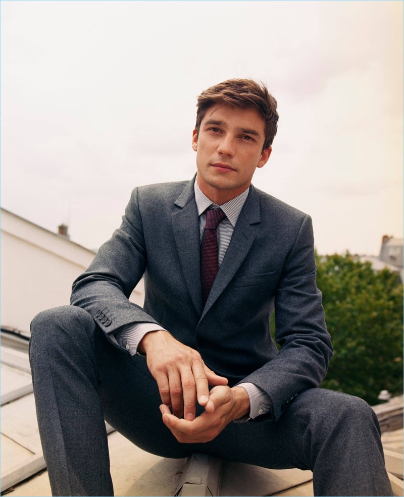 Donning a suit, Alexis Petit appears in Figaret Paris' fall-winter 2018 campaign.