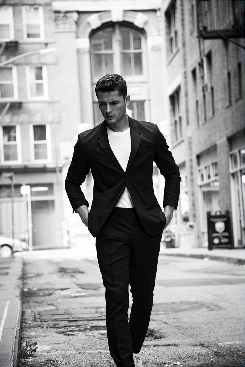 Taking to the streets of New York, Jace Moody dons a trim black suit.