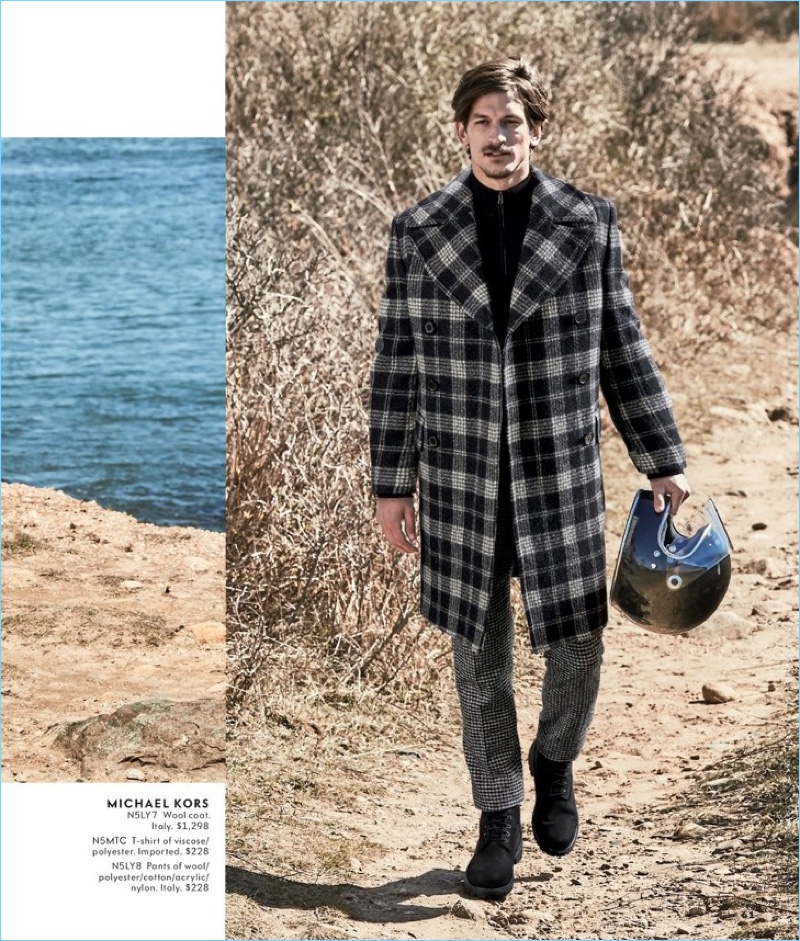 Making a case for plaid, Jarrod Scott wears a Michael Kors coat with a t-shirt and check pants.