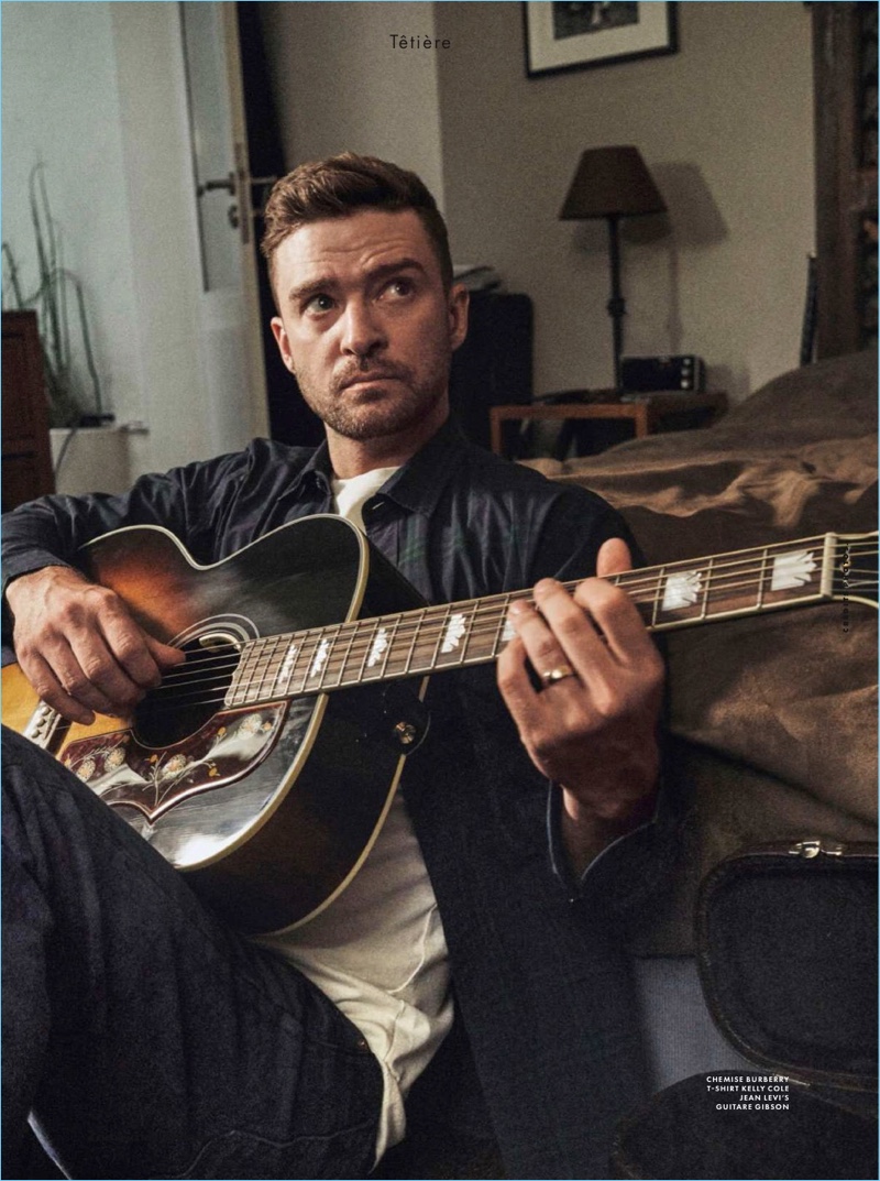 Singer Justin Timberlake sports a Burberry shirt, Kelly Cole t-shirt, and Levi's jeans.