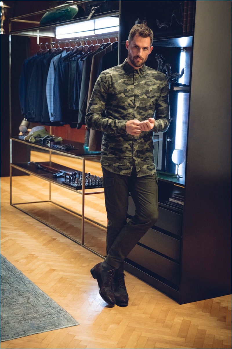 Making a camouflage statement, Kevin Love sports a printed shirt and cargo pants from his Banana Republic collaboration.