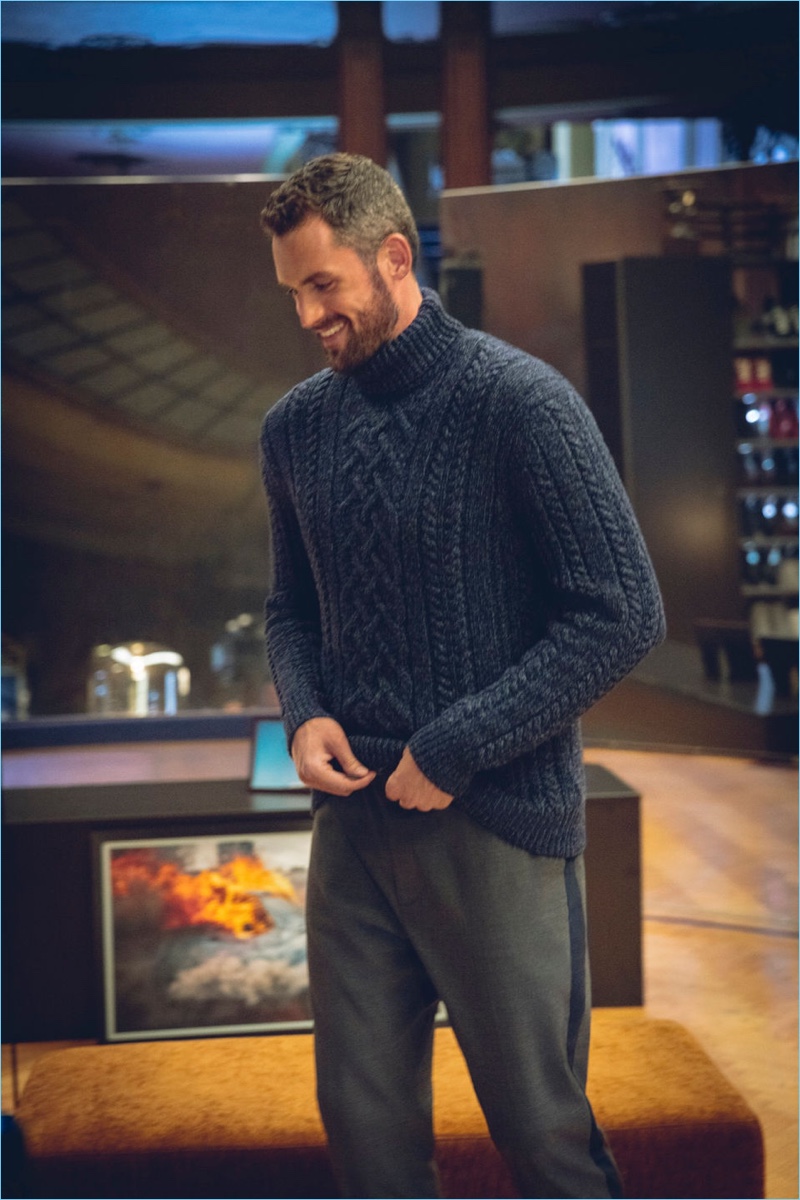 Ready for cold weather, Kevin Love dons a cable-knit turtleneck sweater with wool track pants from his Banana Republic collaboration.