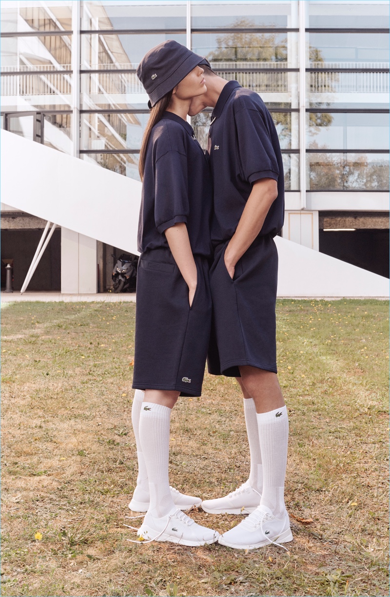 Lily Stewart and Julien Gaenza go sporty in navy looks from Lacoste's spring-summer 2019 collection.