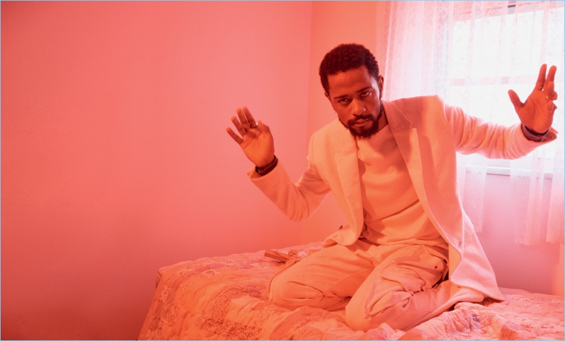Sporting a white suit, Lakeith Stanfield wears Ermenegildo Zegna Couture.