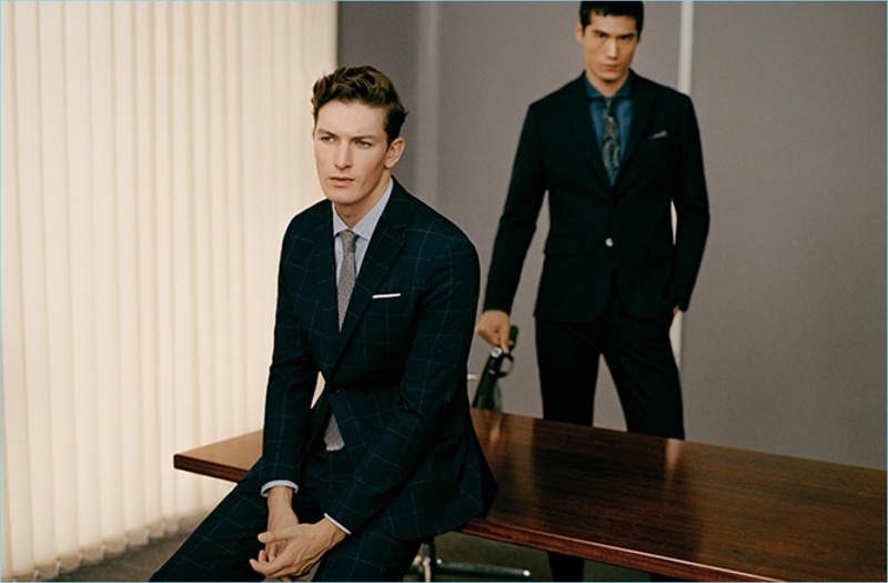 Models Oli Lacey and Hao Yun Xiang model suits for Mango Man's new guide.