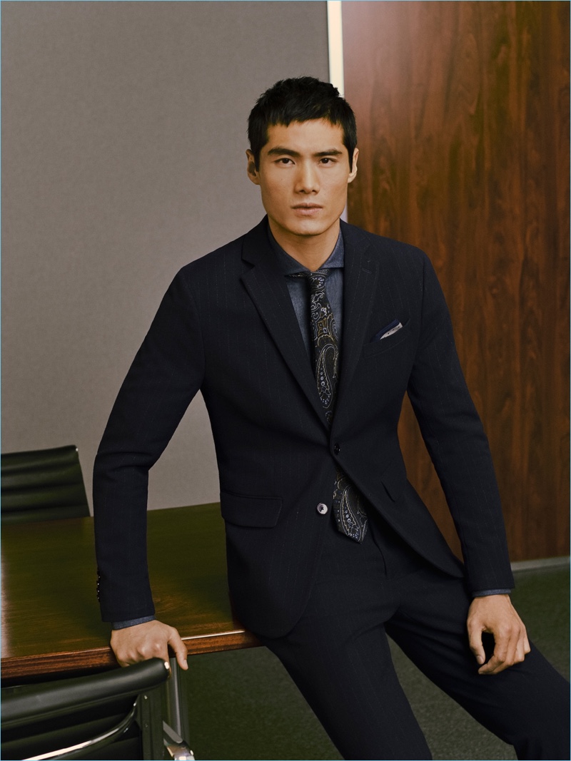 Hao Yun Xiang dons a slim-fit suit from Mango Man.