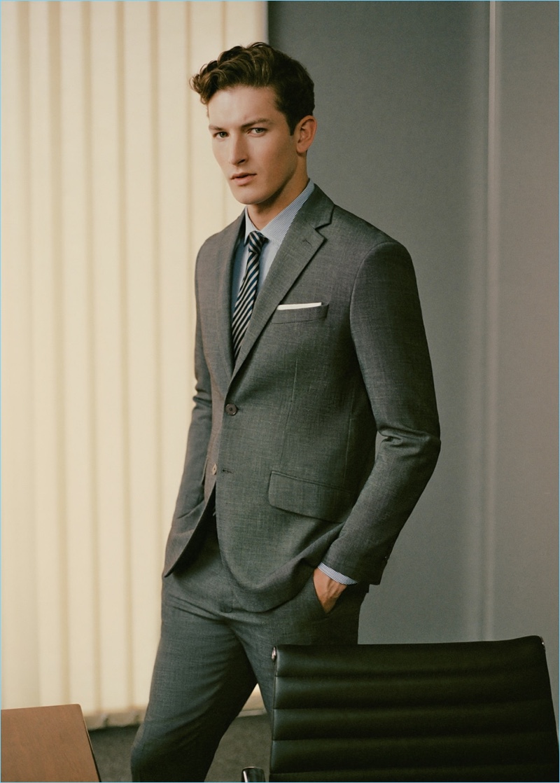 Embracing classic grey, Oli Lacey wears a suit from Mango Man.