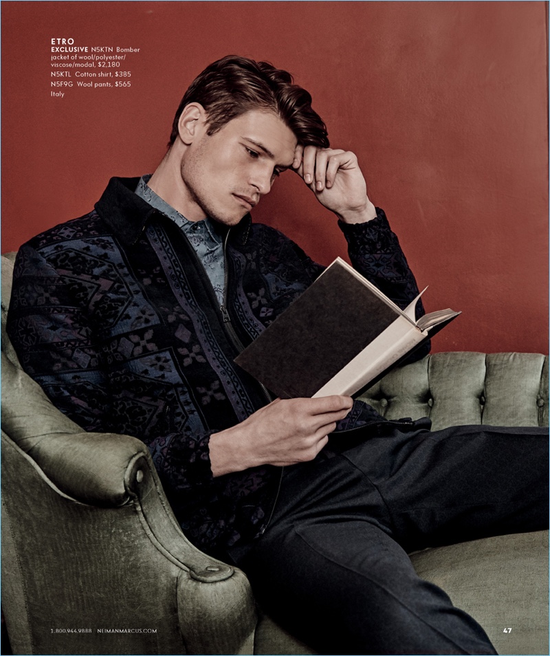 Reading a book, John Todd wears Etro for Neiman Marcus.