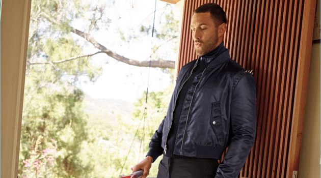 Noah Mills & Malik Lindo Sport Casual Fall Styles for Neiman Marcus Going casual, Noah Mills sports a Valentino spiked-shoulders bomber jacket, cashmere sweater, and sneakers.