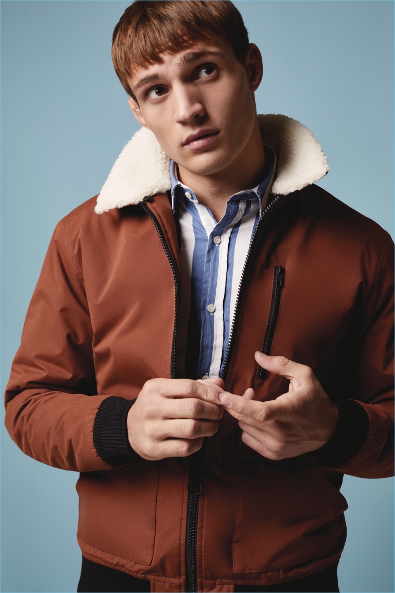 Rocking a bomber jacket, Julian Schneyder connects with Primark for fall.