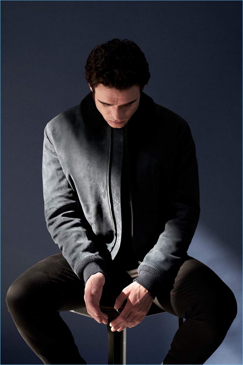 Connecting with Mr Porter, Richard Madden wears a suede jacket with a Mr P. t-shirt and Acne Studios jeans.