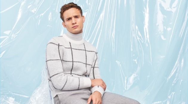 Julian Schneyder Dons Trendy Styles from River Island Christmas Collection Embracing pale shades of grey, Julian Schneyder wears a look from River Island's Christmas collection.