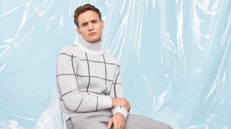 Embracing pale shades of grey, Julian Schneyder wears a look from River Island's Christmas collection.