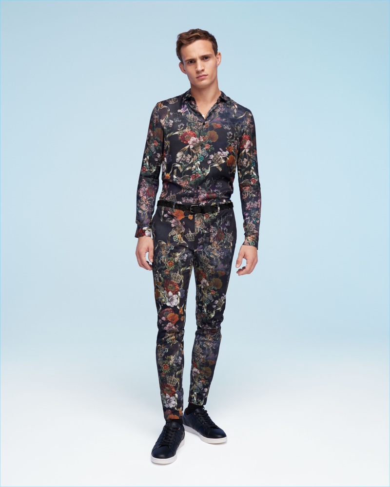 Making a case for floral prints, Julian Schneyder wears a matching shirt and trousers from River Island.