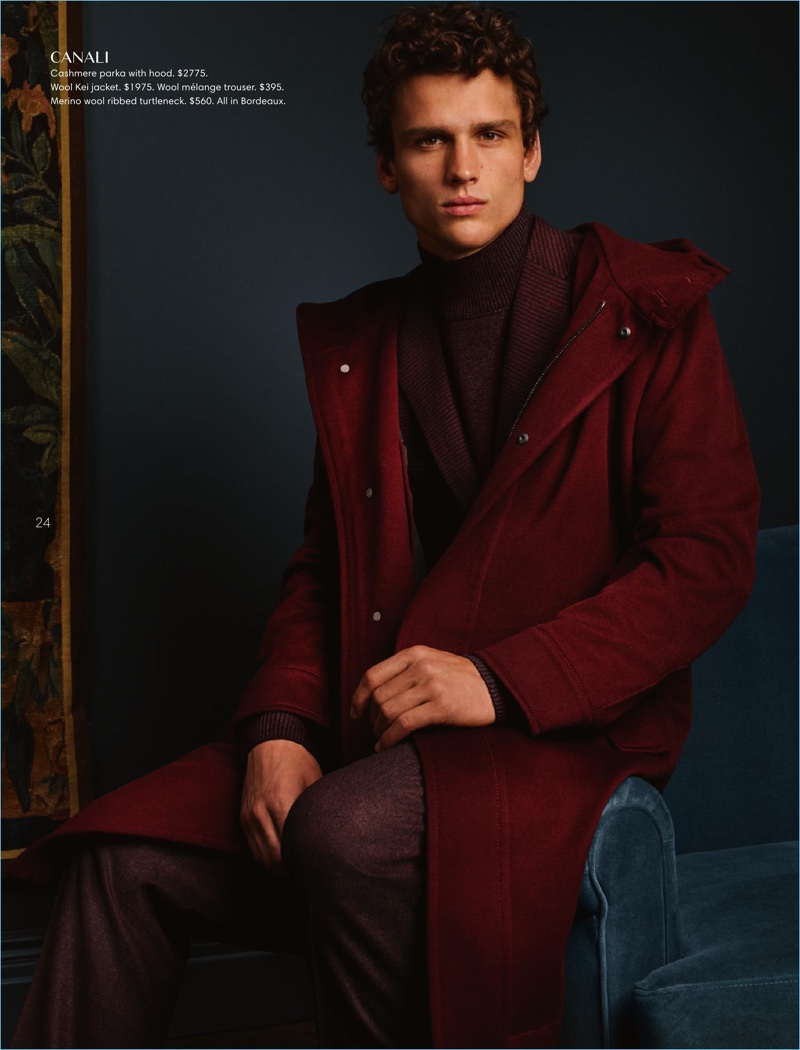 Dressed in red, Simon Nessman wears Canali.
