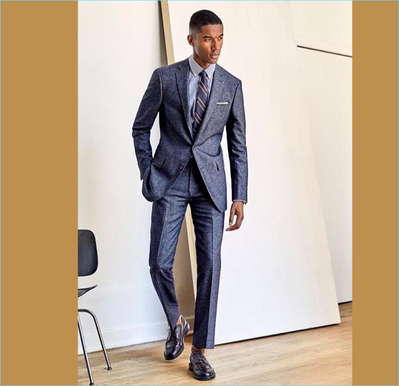 Blue Tweed Sutton Suit: Claudio Monteiro is a striking vision in a sharp tweed suit from Todd Snyder.