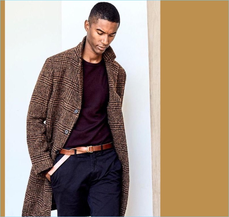 Tailored Topcoat: Claudio Monteiro is ready for the cold with a chic Todd Snyder topcoat in Italian fabric.