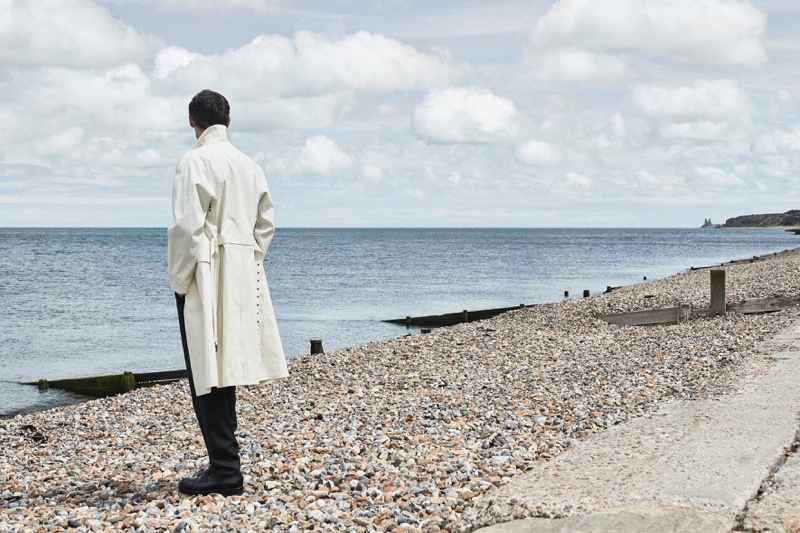 Taking in the sights, Alexander Beck sports a classic trench from Hugo Boss.