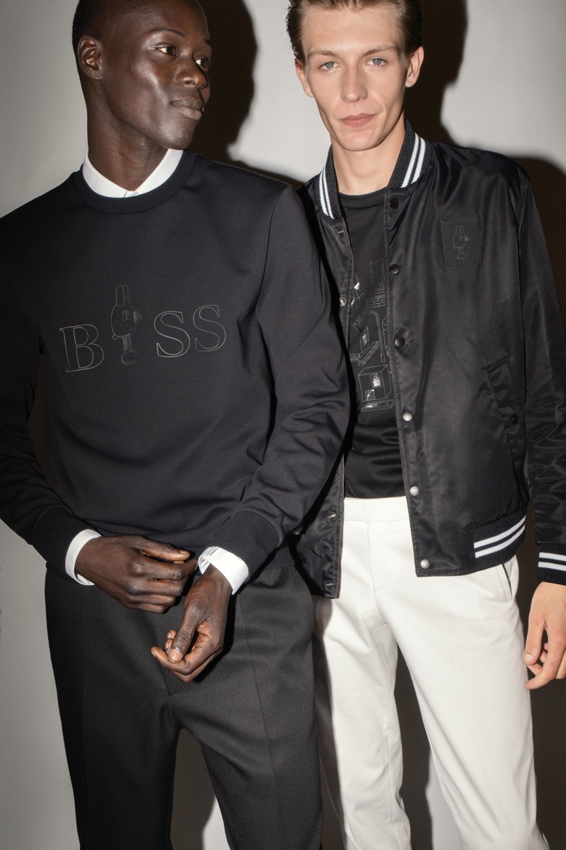 Alpha Dia and Finnlay Davis sport pieces from the BOSS x Jeremyville holiday collection. » BOSS Collaborates with Jeremyville for Holiday '18 Collection Alpha Dia and Finnlay Davis sport pieces from the BOSS x Jeremyville holiday collection.