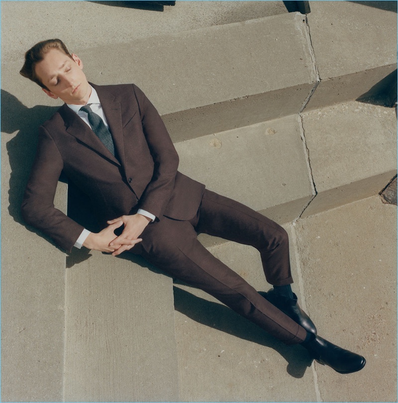 Tom Gaskin steals a moment in an Ermenegildo Zegna wool two-button suit.