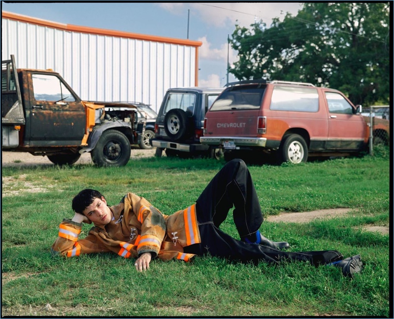 Sporting a Calvin Klein 205W39NYC jacket, Luka Isaac also wears EYTYS jeans and Prada boots.