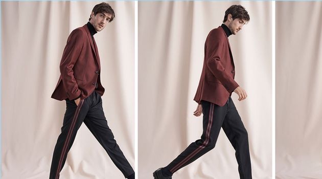 Cool Down, Warm Up: Hamilton Seguin Models New Club Monaco Arrivals Hamilton Seguin wears a burgundy wool flannel blazer, varsity tape pants, and a coverlock turtleneck from Club Monaco. He also dons Wings + Horns Officer shoes.