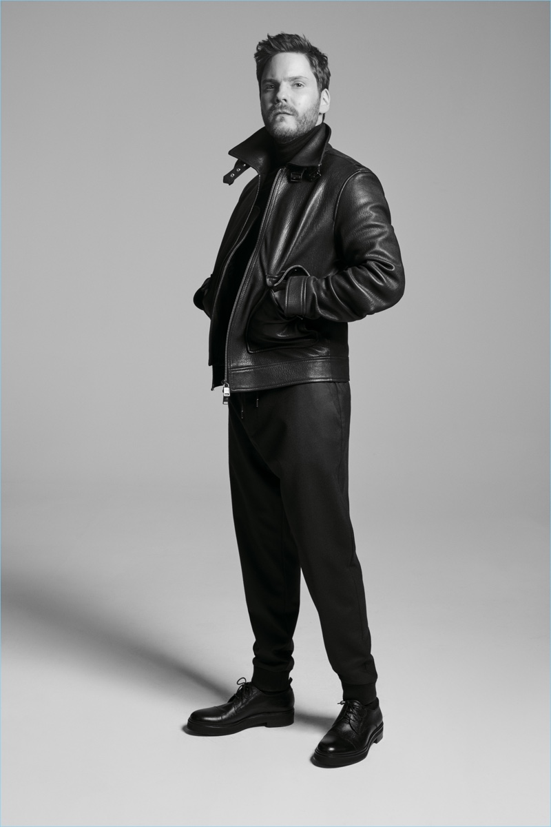 Actor Daniel Brühl dons a leather jacket for the BOSS Made in Germany capsule collection campaign.