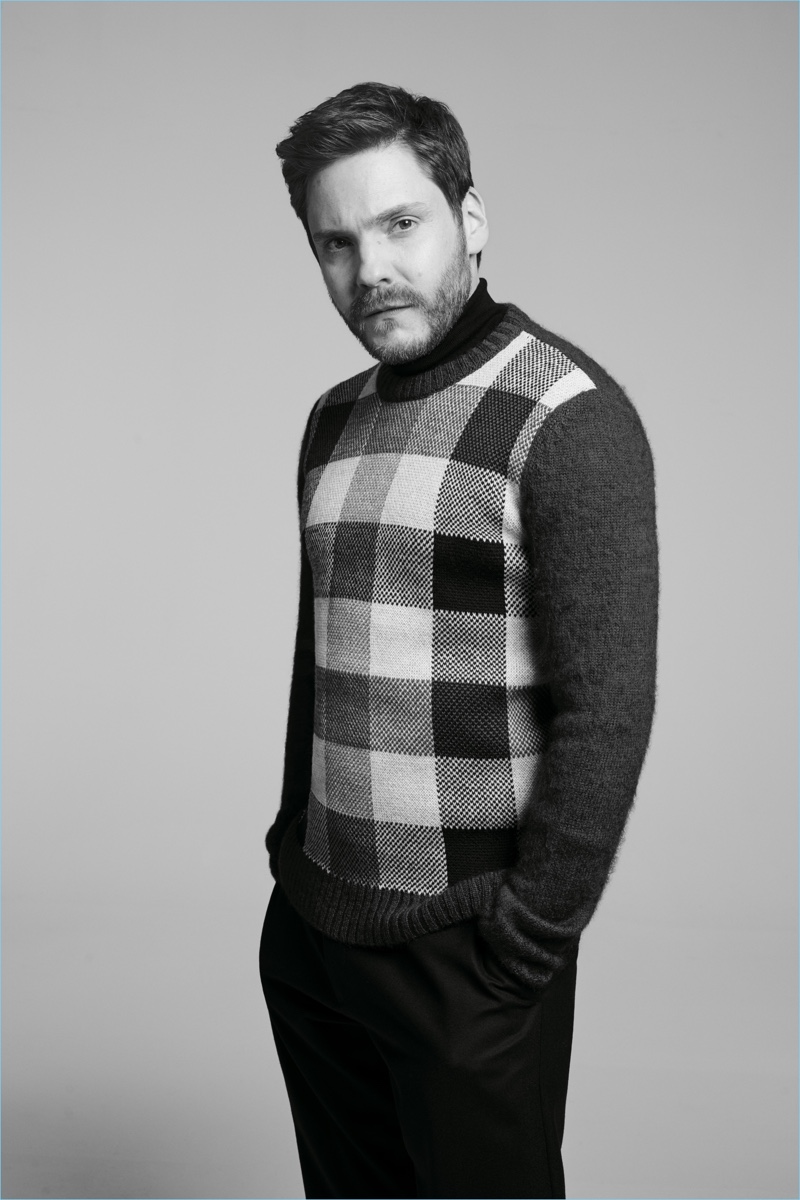 Sporting a check sweater, Daniel Brühl fronts the BOSS Made in Germany capsule collection campaign.