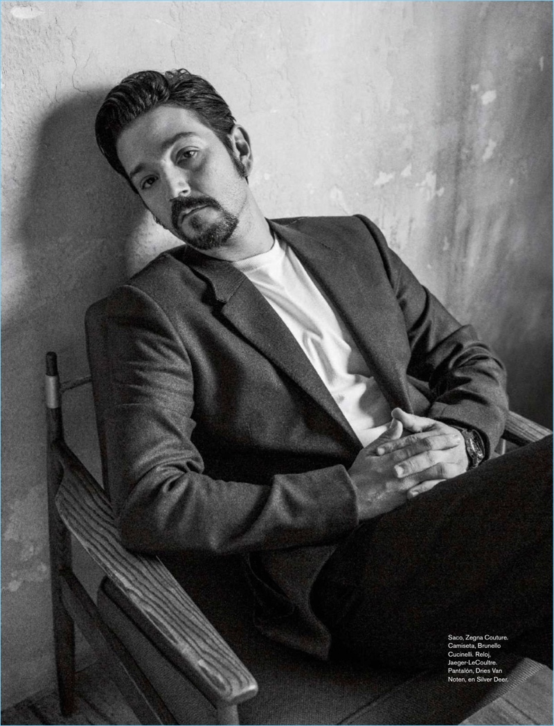 Actor Diego Luna dons an Ermenegildo Zegna Couture jacket, Brunello Cucinelli t-shirt, Jaeger-LeCoultre watch, and Dries Van Noten pants.