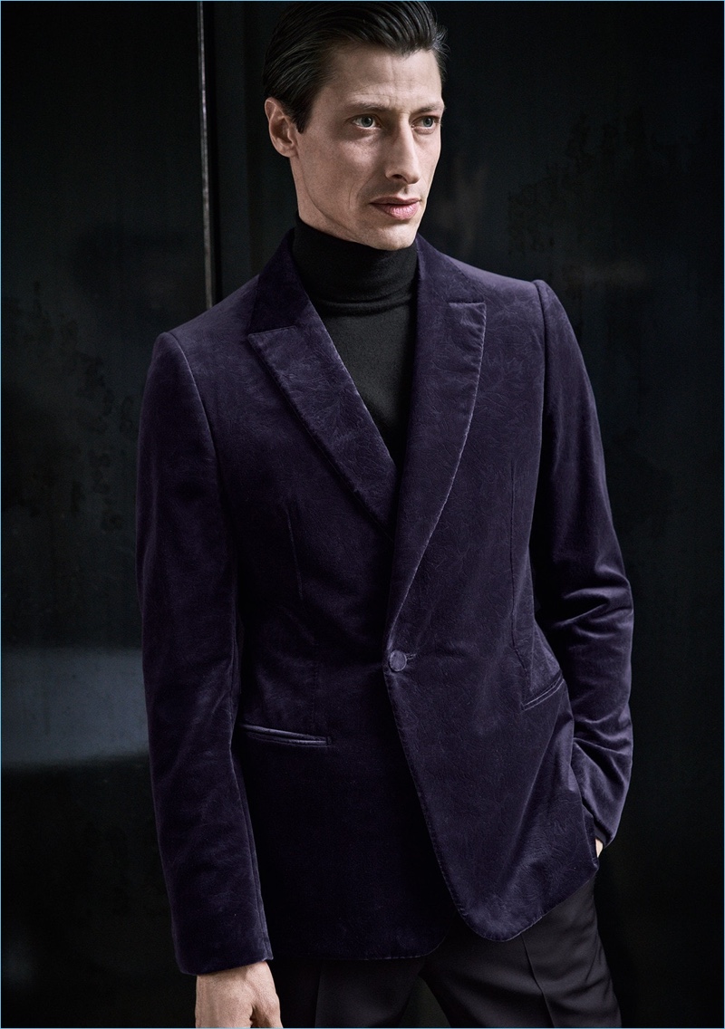 Jonas Mason sports a purple velvet jacket by Ermenegildo Zegna.