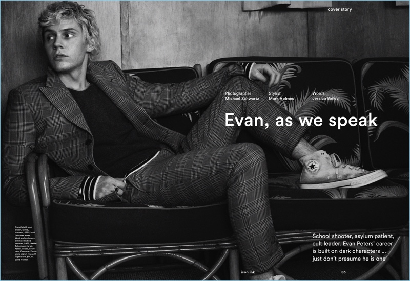 Actor Evan Peters wears a Dries Van Noten suit with a Haider Ackermann sweater. He also sports Converse sneakers.