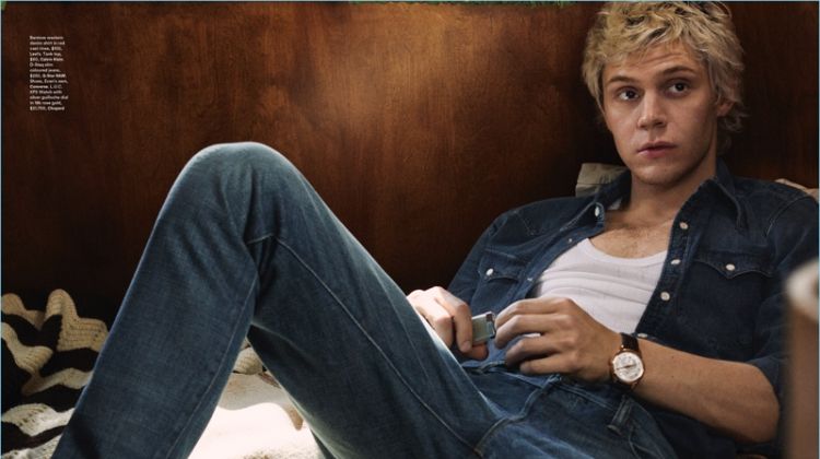 Doubling down on denim, Evan Peters wears a Levi's western denim shirt. Peters also rocks a Calvin Klein tank, G-Star Raw jeans, and Converse shoes.