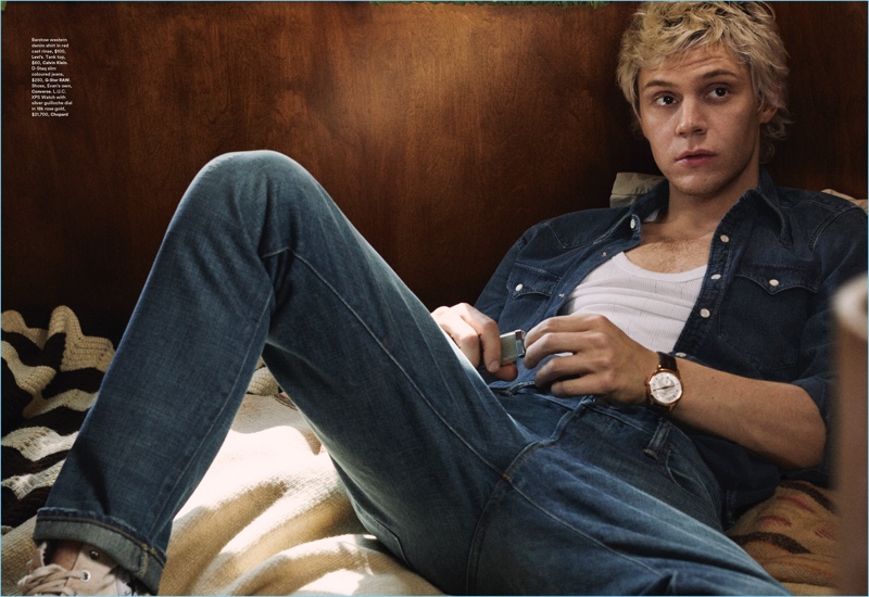 Doubling down on denim, Evan Peters wears a Levi's western denim shirt. Peters also rocks a Calvin Klein tank, G-Star Raw jeans, and Converse shoes. » Evan Peters Covers Icon, Talks 'American Horror Story' Doubling down on denim, Evan Peters wears a Levi's western denim shirt. Peters also rocks a Calvin Klein tank, G-Star Raw jeans, and Converse shoes.