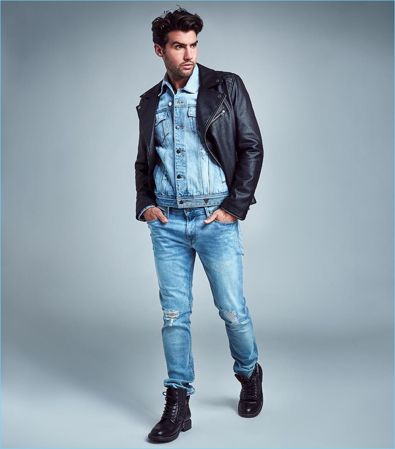 Connecting with GUESS, Mitchell Wick wears the brand's straight-fit jeans.