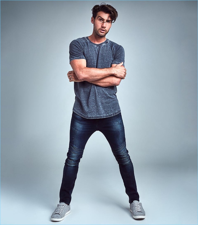 Mitchell Wick rocks skinny-fit jeans from GUESS.